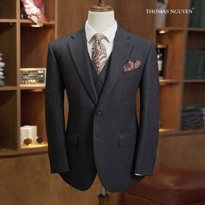 A Three-Piece Tailored Men's <b>Suit</b> in Black Love Letter featuring a Jacket, Trousers, and Waistcoat, Made in Vietnam. - Product Image 1