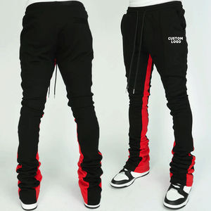 Vente en gros Streetwear décontracté en coton pour hommes avec logo personnalisé pantalon de survêtement baggy de jogging élastique à jambes larges à rayures latérales empilées - Product Image 2