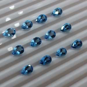 พลอยบลูโทแพซทรงลูกแพร์เจียระไน 100% จากธรรมชาติ สำหรับทำเครื่องประดับ ได้รับการรับรองจากผู้ตรวจสอบอิสระ ขายส่งจำนวนมาก - Product Image 1
