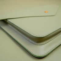 Housses de protection sophistiquées en cuir pour ordinateur portable avec finition élégante, résistance aux rayures, ajustement sûr et design de luxe