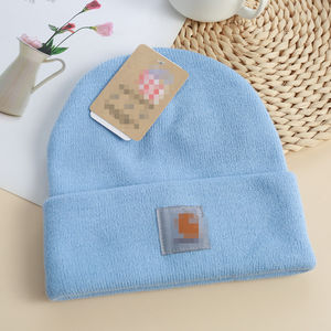 Écusson de broderie personnalisé avec logo pour l'hiver Bonnet en acrylique tricoté avec nœuds noirs unis 60 couleurs pour hommes femmes à revers en acrylique pour la plage - Product Image 4