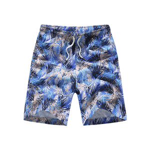 Pantalones cortos de tabla de 7 pulgadas OEM para hombre al por mayor, pantalones cortos de baño de 4 vías elásticos para surf en la playa, pantalones cortos de baño personalizables con patrón sólido - Product Image 1