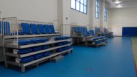 JY-769 Automatische Einziehbare Tribünen Teleskopische Zuschauertribüne Klappbares Sitzsystem für Basketballstadion Sportzentrum