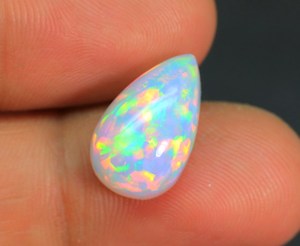 Incroyable pierre précieuse d'opale éthiopienne en forme de poire gemmes d'opale en vrac Welo Galaxy Fire Ethiopian Opal Cabochon au prix de gros - Product Image 1