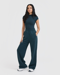 Pantalones acampanados holgados con bolsillos de pierna ancha negros con logotipo personalizado, pantalones cortavientos de nailon Cargo Unisex para mujer - Product Image 5