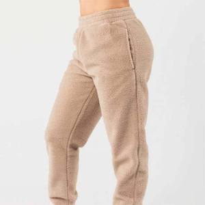 กางเกงวอร์มให้ความอบอุ่นสำหรับผู้ชายและผู้หญิงกางเกงวิ่งมีช่องบุขนแกะมีกระเป๋าใส่ออกกำลังกายโลโก้ได้ตามต้องการ - Product Image 3