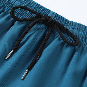 กางเกงขาสั้นอาวร์หะห์ผ้าฝ้าย 100% ลายโลโก้แบบกำหนดเอง สไตล์ลำลอง สีขาวล้วน ระบายอากาศได้ดี เหมาะสำหรับชายหาด ชุดคลุมมุสลิม 2 ชั้น สำหรับผู้ชาย - Product Image 5