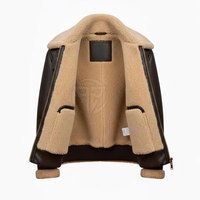 Veste d'hiver moderne en cuir de vachette et peau de mouton avec un design épuré, écologique, légère et chaude, avec une couche intérieure et un logo frontal