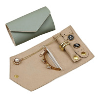 Boîte à bijoux de voyage avec logo personnalisé organisateur pliable rouleau de rangement de bijoux sacs de luxe en cuir PU avec pochette à rouleau de boutons