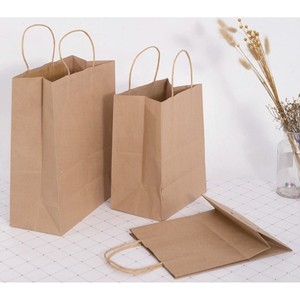 Precio directo de fábrica, bolsa de papel Kraft para ventas con asa trenzada, bolsas de compras, bolsas de productos para el hogar impresas personalizadas - Product Image 5