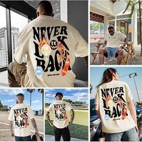T-shirt Oversize Imprimé « Ne Regardez Jamais Arrière » de Haute Qualité pour Homme – Style Urbain en Coton Jersey à Manches Courtes et Col Rond avec Motif au Dos