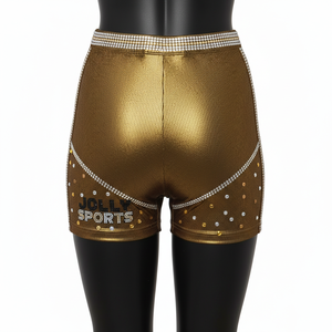 Shorts de mujer con efecto moldeador, de poliéster y spandex, con paneles laterales de tela metálica dorada, logotipo con transferencia térmica de diamantes de imitación. - Product Image 2