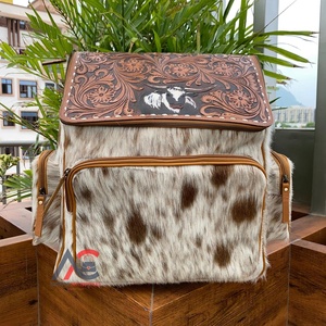 Nuevo 2025 alta calidad Unisex moda logotipo personalizado mano Tooled cuero de vaca portátil mochilas cuero genuino pañal mochila - Product Image 1