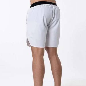 กางเกงขาสั้นจ๊อกกิ้งกีฬาลำลองกลางแจ้งสำหรับผู้ชาย100% ผ้าฝ้ายโพลีเอสเตอร์แห้งเร็วป้องกันรอยยับออกแบบโลโก้ได้ตามต้องการเป็นมิตรกับสิ่งแวดล้อม - Product Image 3