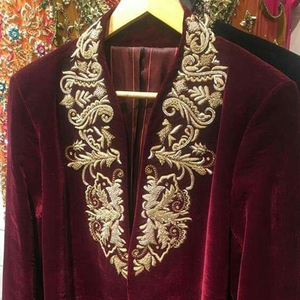 MAROON--JACKET WITH PANT ON VELVET FABRIC WITH EMBELLISH OF BEAUTIFUL CRYSTAL BEADS,PEARLS,GLASS STONE WORK FOR PARTY-WEAR@2022 - Product Image 1