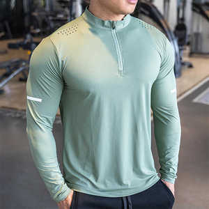 Camisetas de gimnasio de manga larga con diseño en blanco para hombre: ropa deportiva de compresión de secado rápido para entrenamientos de otoño y correr - Product Image 1