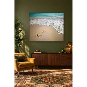 Impression sur toile Fida : Deux étoiles de mer au bord de la mer sur la plage - Product Image 2