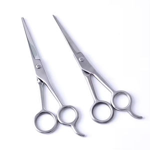 Ciseaux de barbier de qualité salon offrant une coupe contrôlée, une manipulation fluide et des résultats impeccables pour les coiffeurs professionnels - Product Image 1