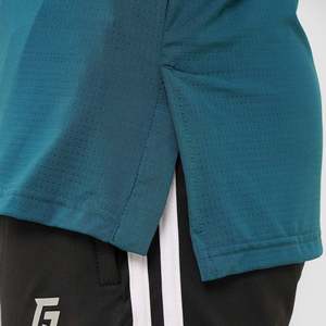 Youth <b>100</b>% <b>Polyester</b> Motion Tee in Teal Breathable Knitted Fabric with Loose Fit and <b>Yarn</b> Dyed Logo Plain Dyed - Product Image 5