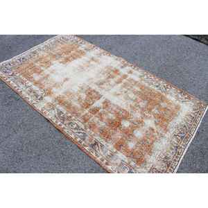 Tapis vintage 3,8x6,9 pieds, tapis turc, tapis à imprimé animalier marron et bleu - Product Image 1