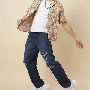 Jeans rasgados desgastados para hombres con un ajuste cónico y jeans rasgados resistentes con borde delantero a la moda - Product Image 2