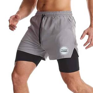 Pantalones cortos para correr sólidos ecológicos, ropa de entrenamiento atlético de gimnasio transpirable de secado rápido con bolsillos laterales - Product Image 1