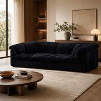 Canapé d'angle moderne noir en tissu texturé, deux places, avec accoudoirs capitonnés et coussin de siège rembourré en éponge, idéal pour appartement et hôtel