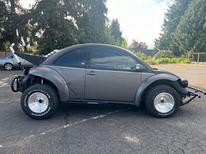 VOLKSWAGEN NEW BEETLE 2008 D'OCCASION CÔTÉ GAUCHE/DROIT - Product Image 2