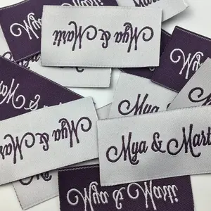Etiqueta de ropa personalizada tejida de tafetán de poliéster con logotipo personalizado Etiquetas de ropa ecológicas para trajes de baño - Product Image 3