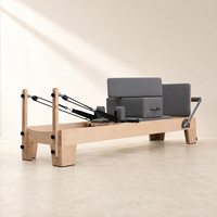 Lit de Pilates Reformer avec cadre en érable d'Amérique du Nord massif, ressorts allemands et poulies réglables pour studio et usage domestique