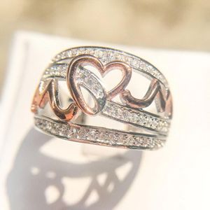 Bague en diamant avec réglage de canal de coupe ronde - Product Image 3