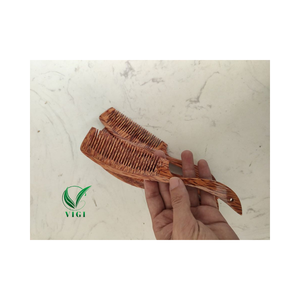 Desbloquea la belleza de la naturaleza: peines de madera de coco hechos a mano vietnamitas para un cabello más fuerte, saludable y sedoso - Product Image 3