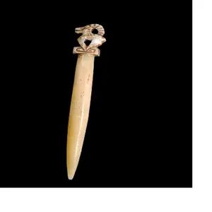 custom made bone hair sticks with hand carved designs of animals like reindeers for resale by hair accessory..