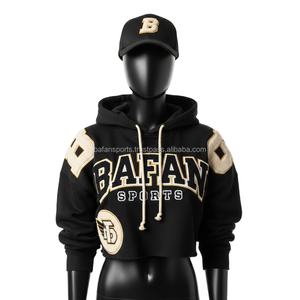 <b>Women</b> <b>Crop</b> <b>Top</b> Hoodie Premium 320 GSM Soft Fleece <b>Black</b> with Beige Shoulder Panels Embroidered Custom Logo Chenille Patch Design - Product Image 1