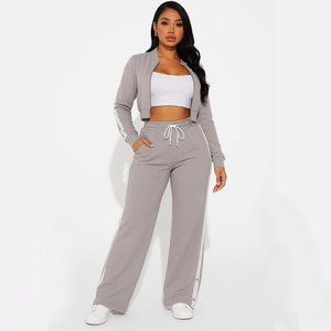 Conjunto de chándal gris de mujer al por mayor, conjunto de chaqueta y pantalón de dos piezas a la moda - Product Image 1