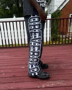 Pantalones bordados personalizados con logotipo de serigrafía para hombre, pantalones informales holgados impermeables, cortavientos de poliéster 100%, pantalones de chándal de nailon - Product Image 3