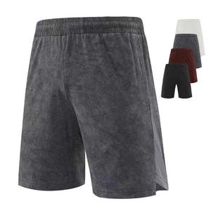 Bermudas décontracté à cinq paires pour hommes, en toile à séchage rapide, à taille élastique, à motif solide pour le fitness, la course à pied et l'extérieur. - Product Image 1