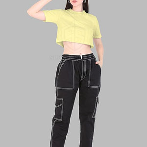 เสื้อยืดครอปไซส์ใหญ่สำหรับผู้หญิงระบายอากาศได้ดีสีพื้น - Product Image 6