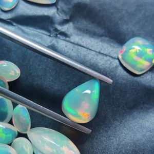 โอปอลทรงหลังเบี้ยโอปอลอัญมณีสีขาวทรงต่างๆจากเอธิโอเปียนธรรมชาติรูปทรงกลมลูกแพร์มาร์คีสสามเหลี่ยมสี่เหลี่ยมขนาด2มม. 20มม. - Product Image 2