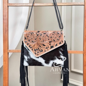 กระเป๋าสะพายไหล่หนังวัวสำหรับผู้หญิงกระเป๋าหนังมีพู่ประดับมือทันสมัยแบบไม่เหมือนใคร - Product Image 1