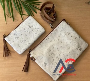 Bolso bandolera de piel de vaca metálico de nuevo diseño OEM 2024 al por mayor y conjunto de mujer con cremallera y pelo de piel de vaca - Product Image 1