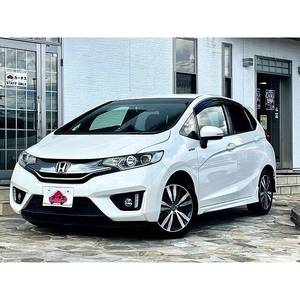 Honda Fit Hybrid Aspire 2013 - Voiture d'occasion - Manuelle/Automatique - Conduite à gauche/droite - Essence - Moteur 4L - Sièges en tissu - Intérieur clair - R18 - Product Image 1