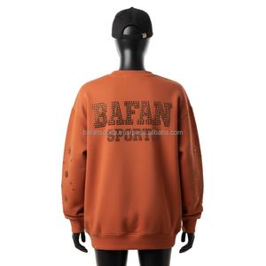 Women Oversize Sweatshirt GSM <b>Brushed</b> Fleece Burnt Orange with Rhinestone Custom Logo Sleeve Design Women breathable Sweatshirts - Product Image 2
