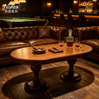 Table basse ovale en bois massif avec double piétement, 2 options de pieds : balustre moderne ou sculpté, grande table de salon