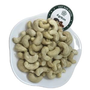 Noix de cajou brutes de la nouvelle récolte 2023, qualité supérieure, grade W320, noix de cajou entières séchées, fabricant direct du Vietnam, téléphone +84 - Product Image 1