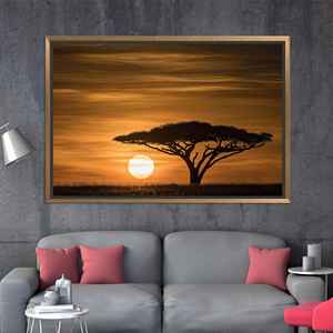 Impresión en lienzo Serengeti Sunrise: decoración vibrante con paisaje africano, lienzo con marco dorado - Product Image 1