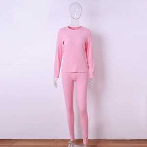 Ropa de un color para mujer, Top deportivo y mallas de entrenamiento de cintura alta, conjunto de Yoga JIN Fitness con estampado personalizado - Product Image 2