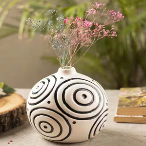 Contemporary matte white donut-shaped <b>ceramic</b> vase with a hollow center <b>ring</b>, available at wholesale prices. - Product Image 4