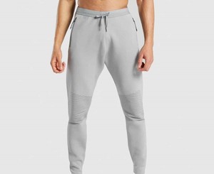 OEM Pantalons de jogging doublés en polaire de haute qualité pour hommes 3 poches zippées Pantalons de gym chauds et décontractés pour l'hiver pour la course à pied - Product Image 1