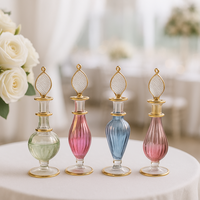 Flacon de parfum en verre soufflé à la main de luxe, Égypte |   Artisanat écologique au design doré |   Forme ovale, multi-capacités, exportation en Europe
